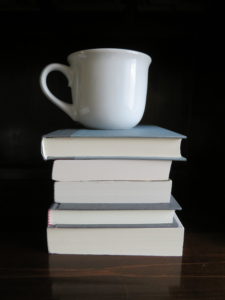 Giant Coffee Mug on Books